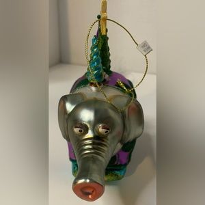 Ornament …glass elephant with Christmas trees ,lashes and fluffy tail